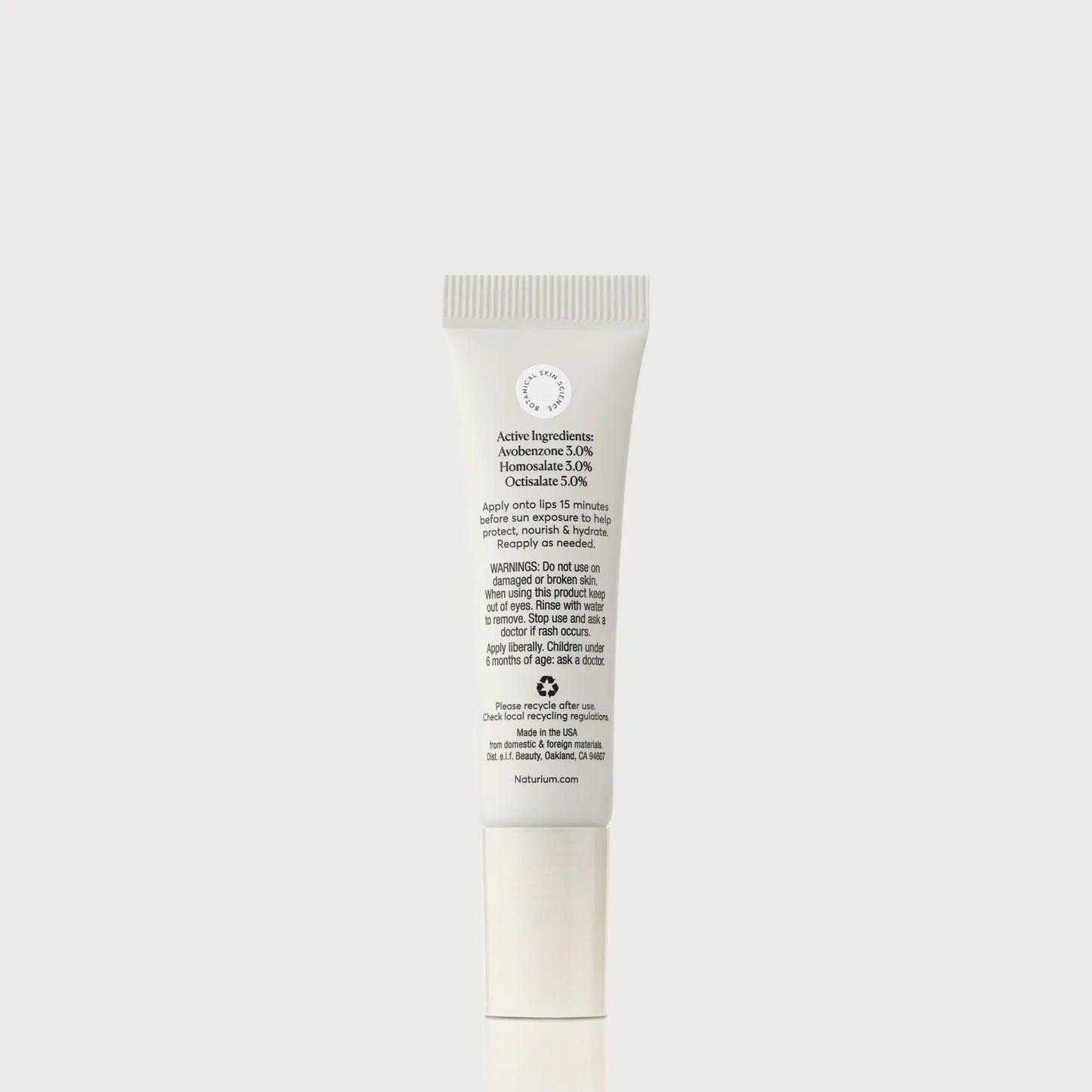 phyto-glow-lip-balm-spf-45-clear-r0 NATR-10124_PhytoGlow_SPF_Clear_primary_capon_back_bonebkgd_1.webp