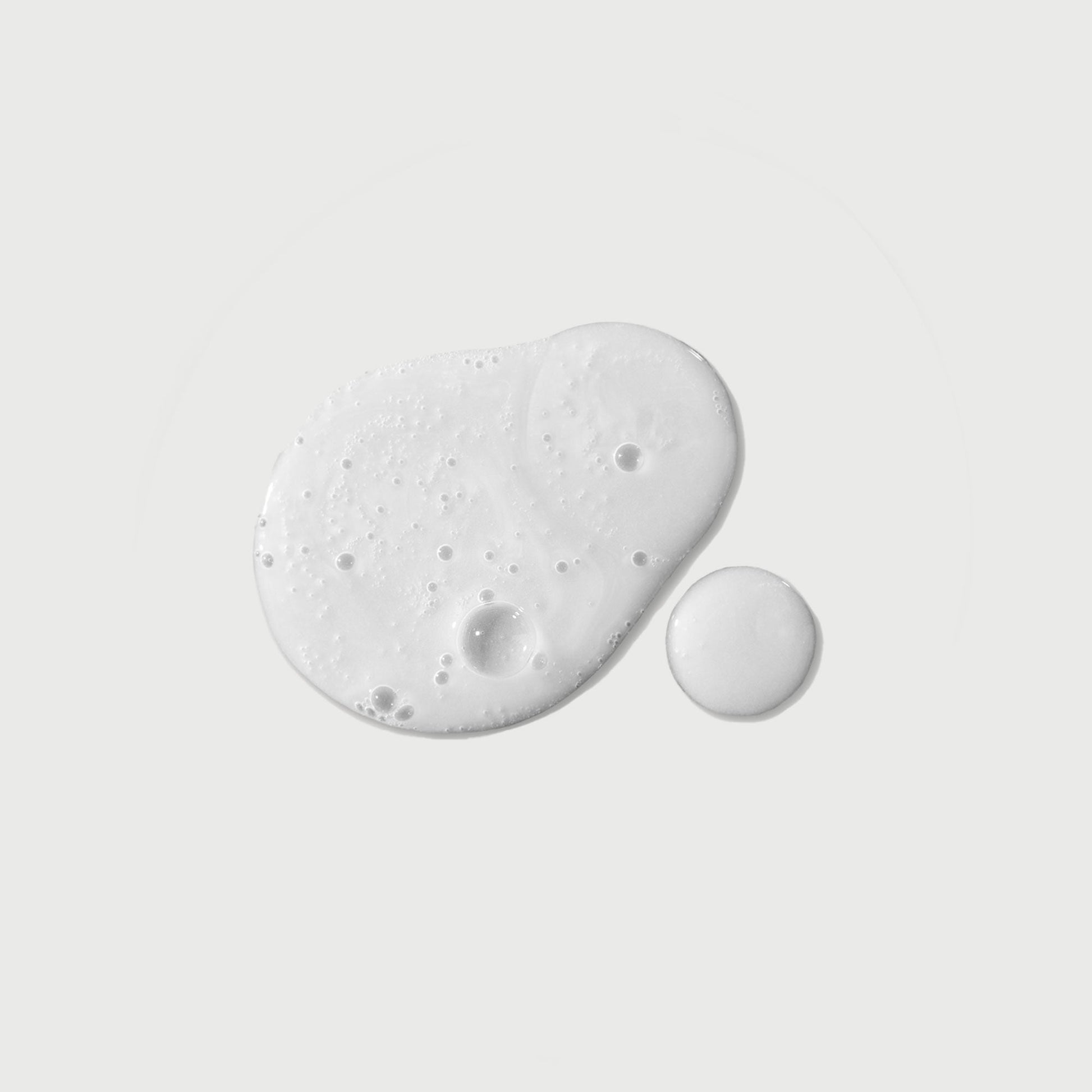 the-purifier-niacinamide-serum-body-wash-p0 NATR-40012-Swatch-The-Purifier-Niacinamide-Serum-Body-Wash-bonebkgd.jpg