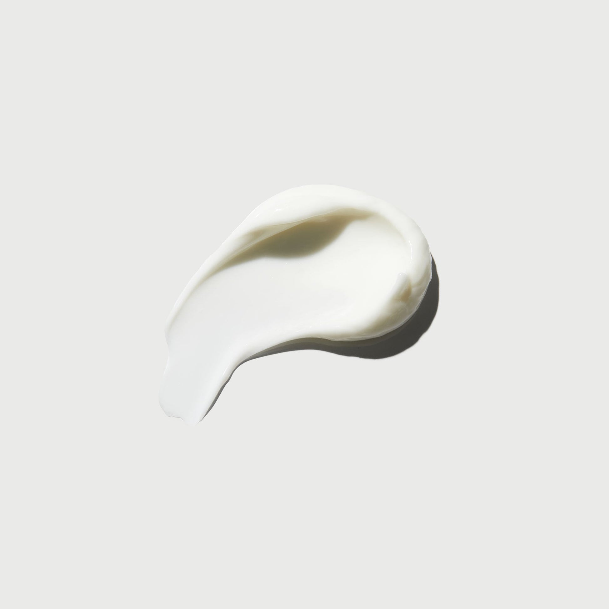 the-smoother-glycolic-acid-body-lotion-w2 NATR-40014-Swatch-The-Smoother-Glycolic-Acid-Body-Lotion-bonebkgd.jpg
