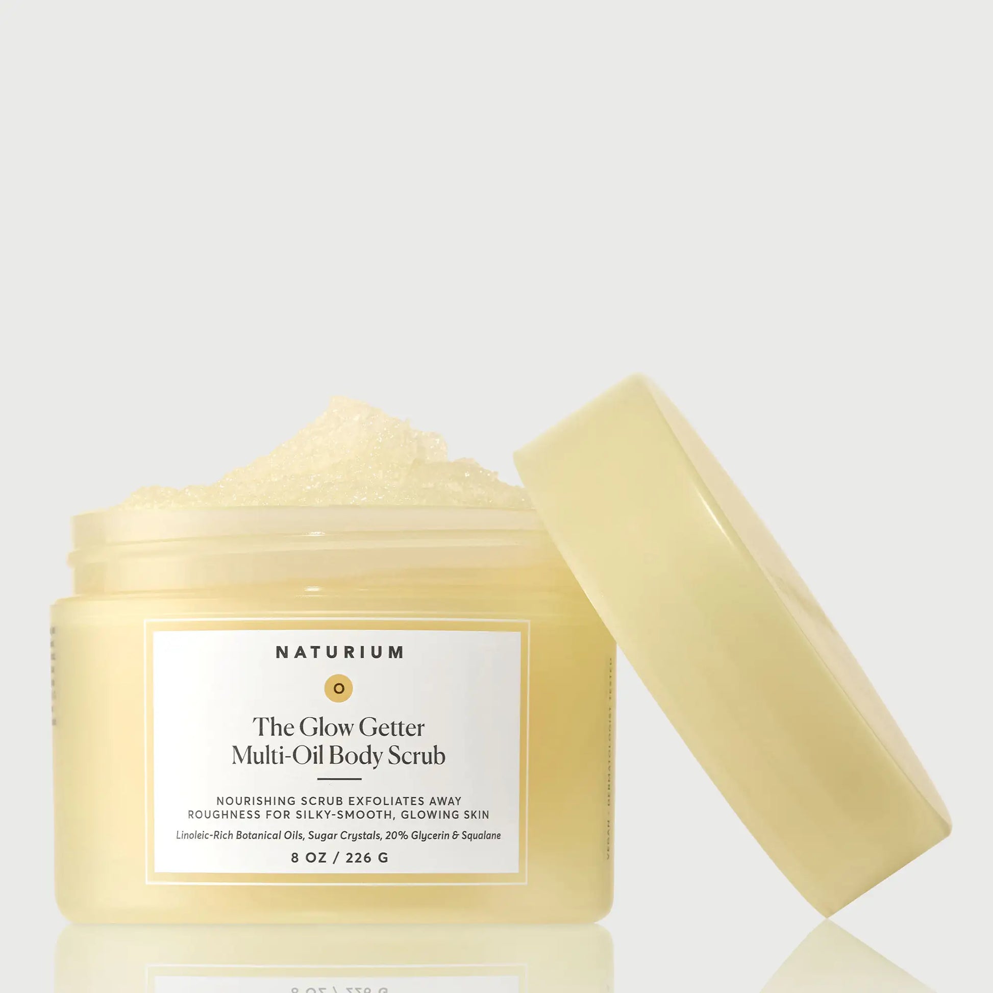 the-glow-getter-multi-oil-body-scrub-q3 NATR-40028-GlowGetter-Multi-Oil-Body-Scrub-Front-CapOff-bonebkgd.webp