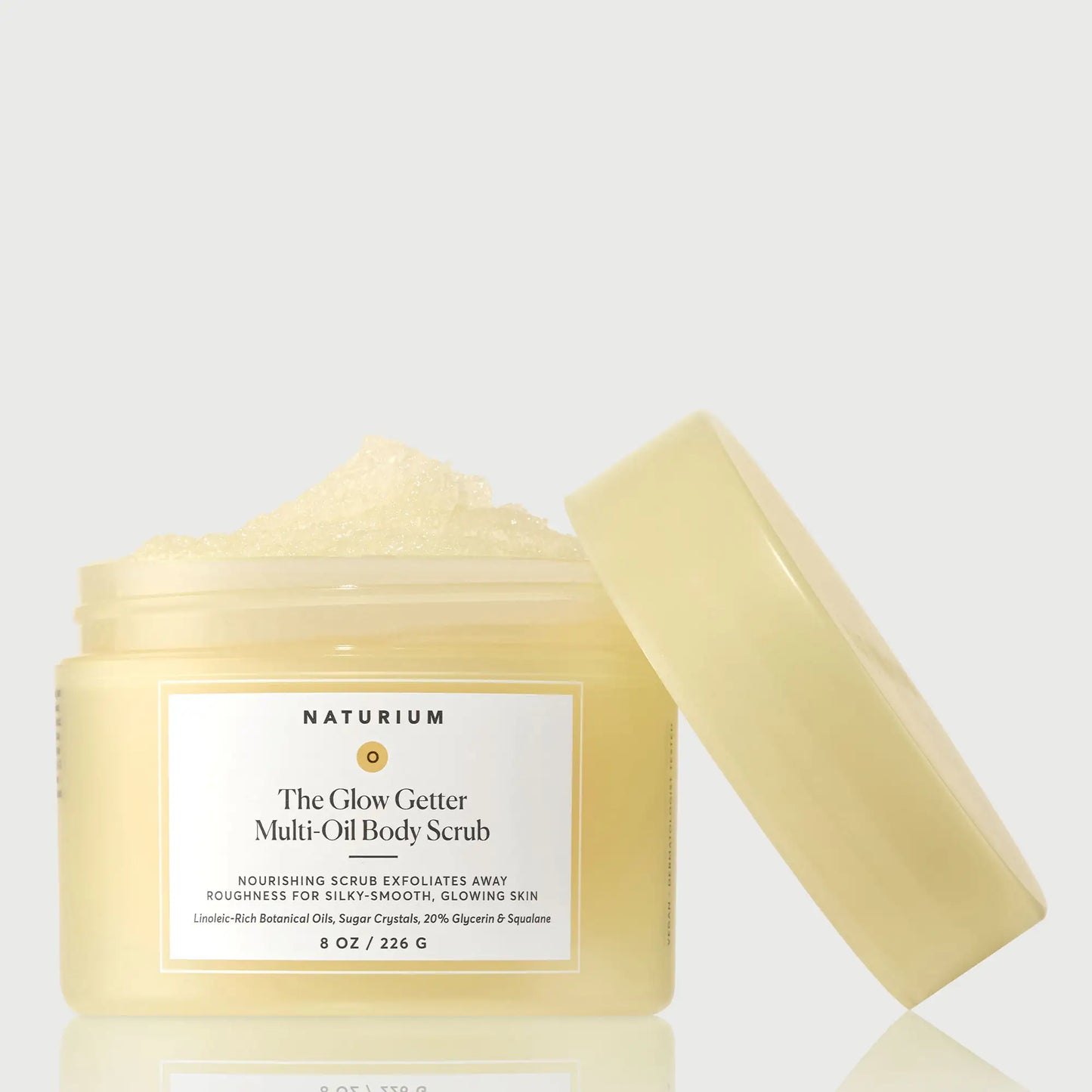 the-glow-getter-multi-oil-body-scrub-q9 NATR-40028-GlowGetter-Multi-Oil-Body-Scrub-Front-CapOff-bonebkgd.webp