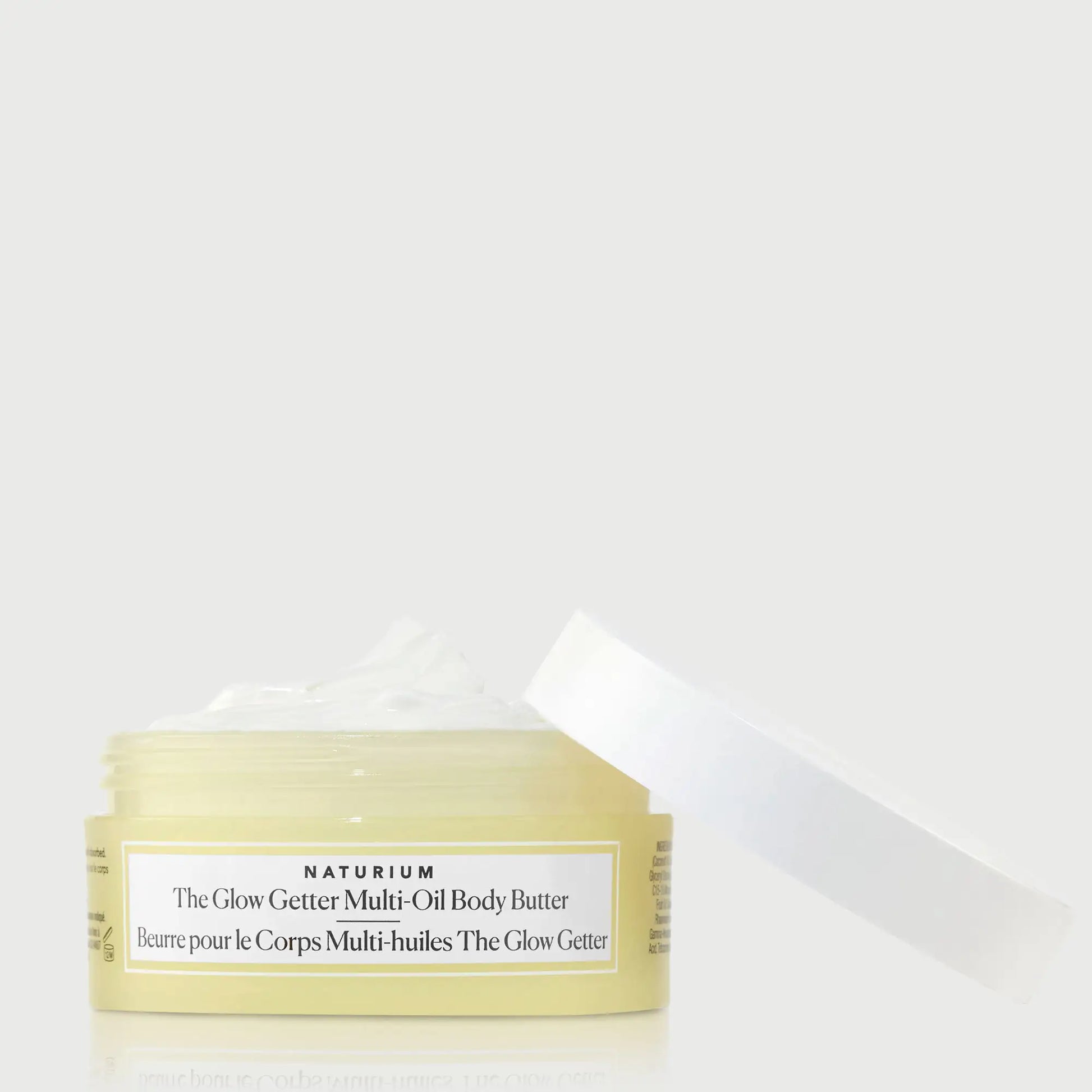 the-glow-getter-multi-oil-body-butter-travel-size-q0 NATR-40115_Glow-Getter-Body-Butter-Mini_front_capoff_bonebkgd.webp